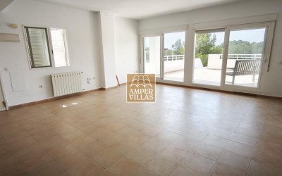 A sunny apartment with lovely wide views and a large terrace.